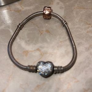 PANDORA bracelet with PANDORA Rose Clip Row of Hearts